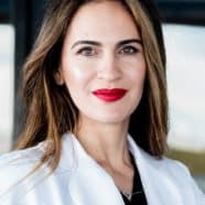 Dr. Soleiman, Expert Cosmetic Injector, Smiling in Professional Headshot - Cosmetic Injectables Center